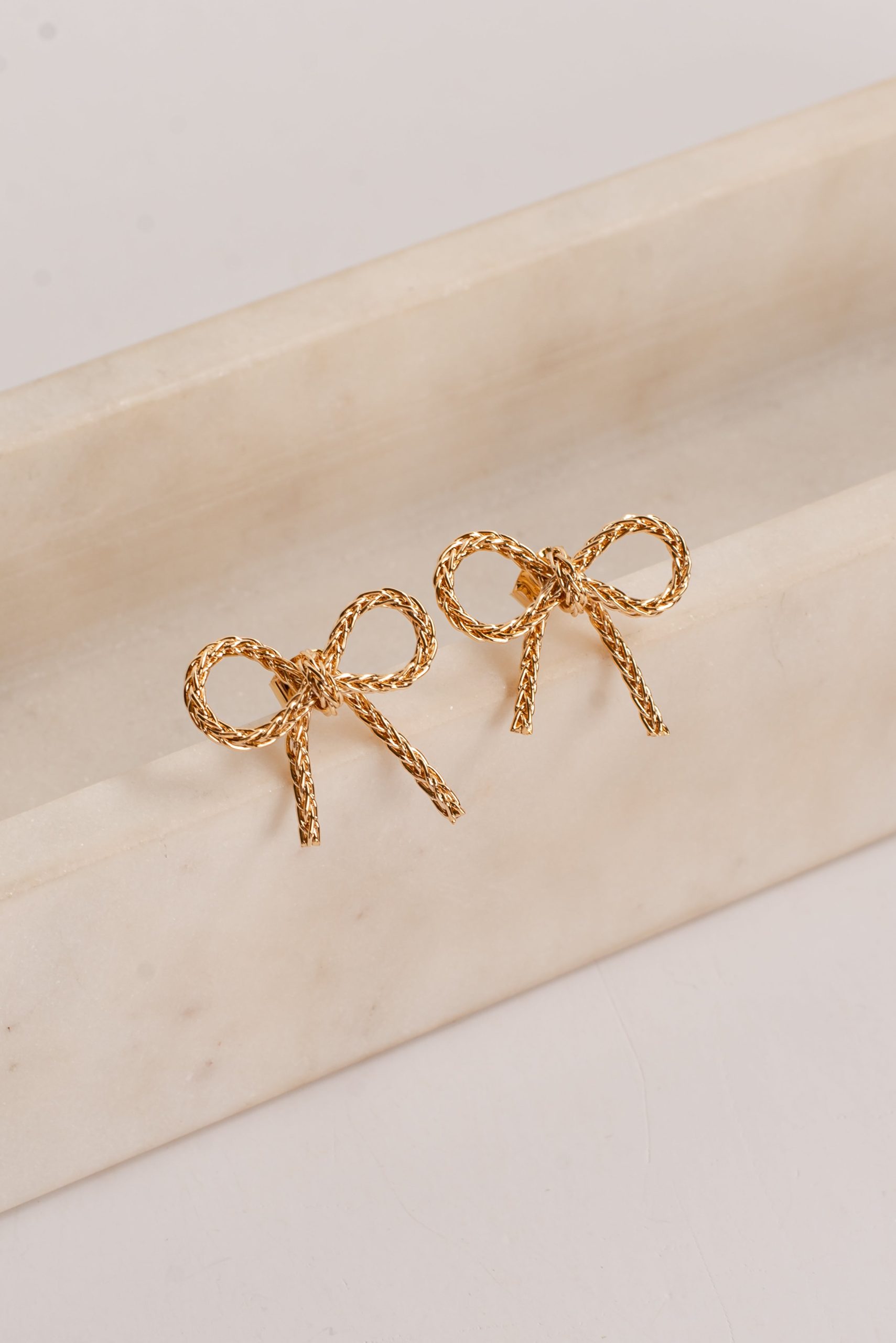 shopdressup_gold_bow_earrings-2_2f0f79da-fe67-41c4-b6d2-10ac46008075.jpg